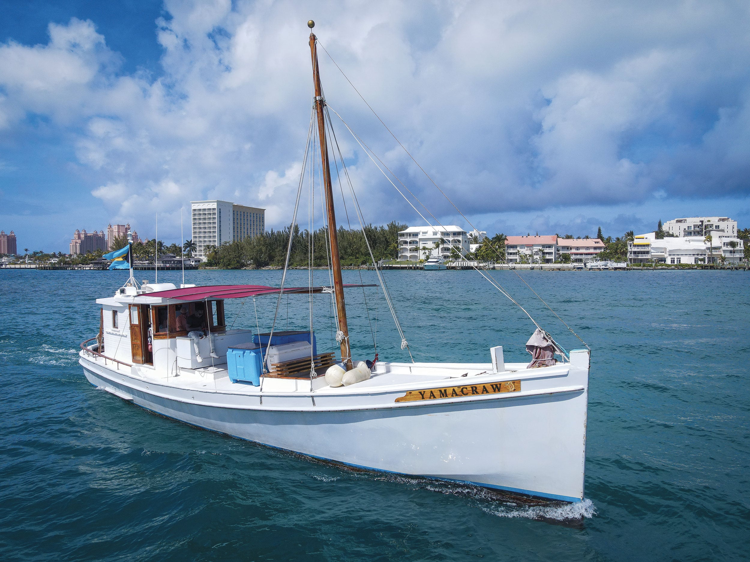 White Chesapeake Bay buyboat named YAMACRAW on the water.