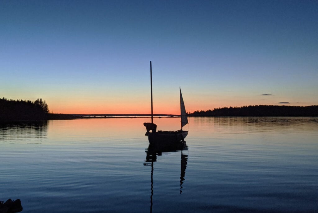 boat on mooring at sunset